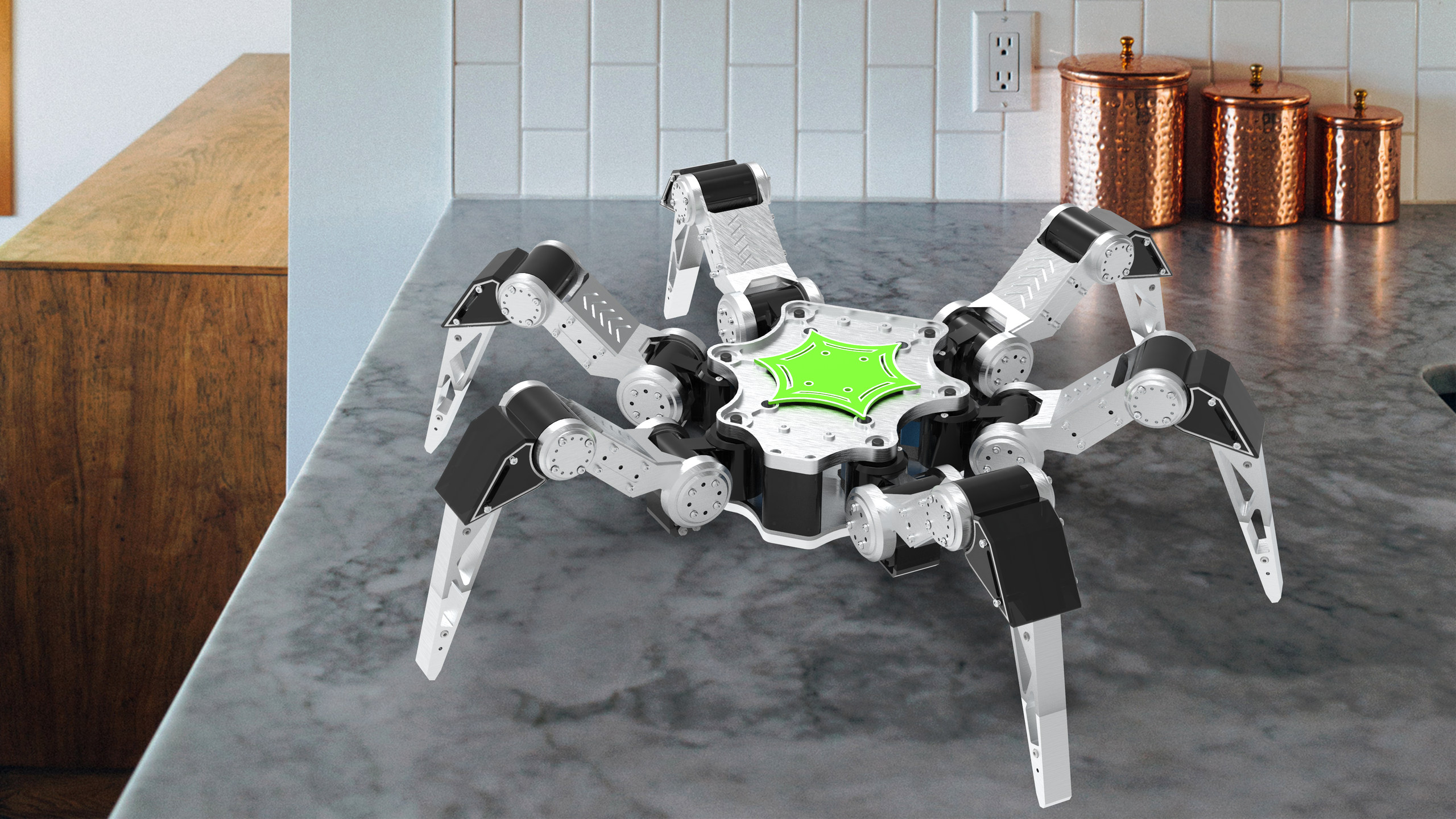 A rendered six-legged spider robot with a green center viewed at an angle on a workshop surface